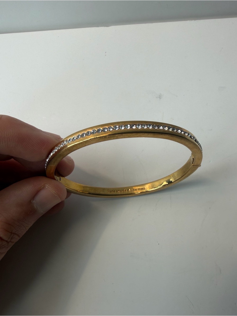 Kate Spade Ring It Up Pave Bangle Bracelet Gold Tone Clear Crystal Hinged Oval